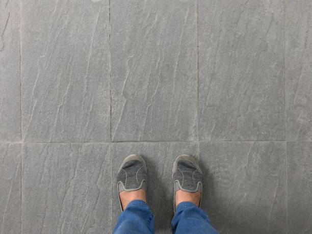 istock Girl standing on the floor 839658736
