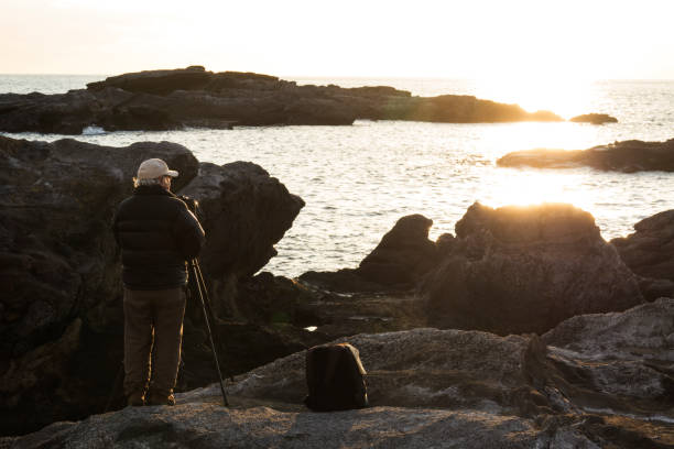 istock Senior Photographer Taking Pictures 839690146