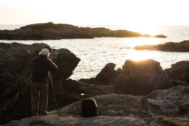 istock Senior Photographer Taking Pictures 839690652