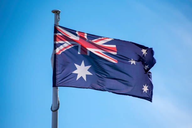 istock Australian flag flying against a blue sky. 839698956