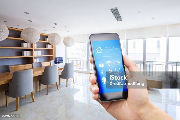 Smart Phone In Modern Meeting Room Stock Photo - Download Image Now - Automated, Remote Location, Thermostat