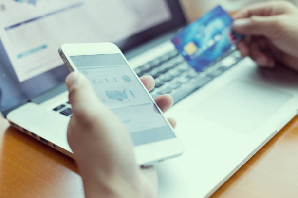 istock hands with credit card and laptop 839763534