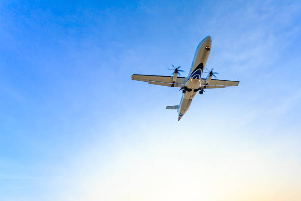 istock Airplane in the sky and cloud at sunrise 839790678