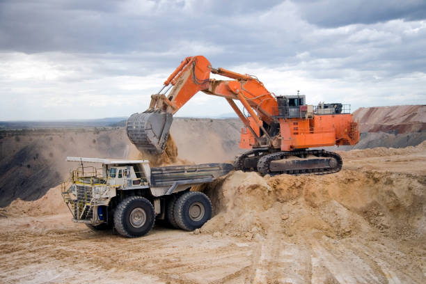Coal Mine Excavator and Dump Truck stock photo