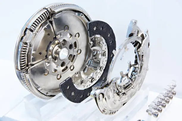 Clutch system with dual mass flywheel, pressure plate and concentric slave cylinder