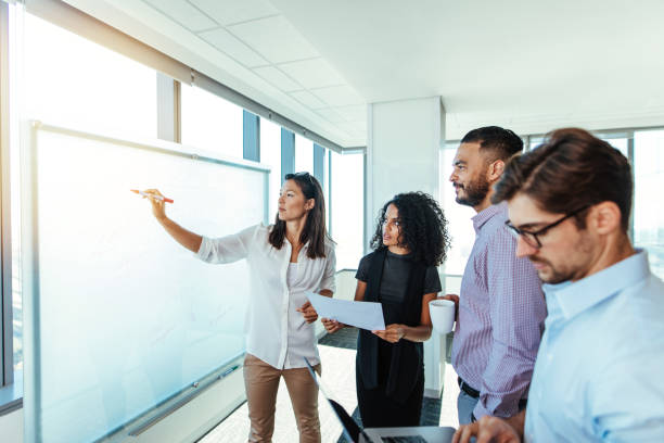 istock Entrepreneurs discussing business ideas in boardroom. 839818372