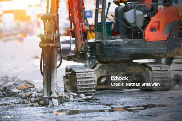 Drilling Road Stock Photo - Download Image Now - Backhoe, Road, Hammer