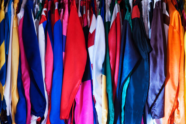 Colorful Jockey Silks Hanging In A Row Stock Photo - Download Image Now - Jockey Silks, Jockey, Colors - iStock