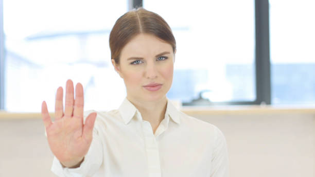 istock Stop Gesture by Woman in Office 839825404