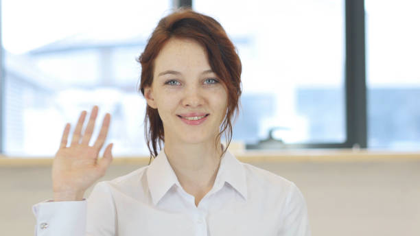 istock Hello, Woman Waving Hand 839825600