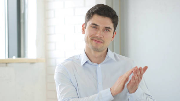 istock Applauding, Clapping Businessman in Office 839833434