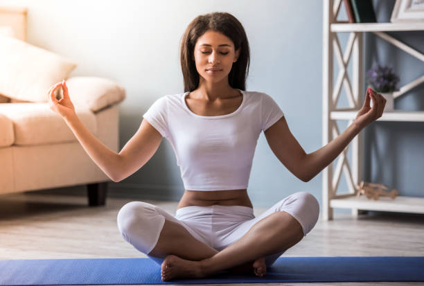 istock Afro American girl doing yoga 839833648