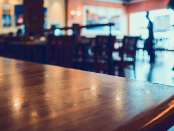 restaurant with abstract bokeh light blur background - coffee serving cafeteria worker checkout counter imagens e fotografias de stock