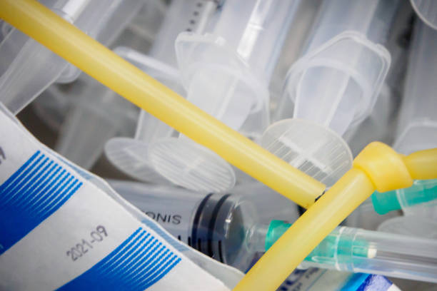 istock Multiple plastic syringes with needles and tourniquet 839842162