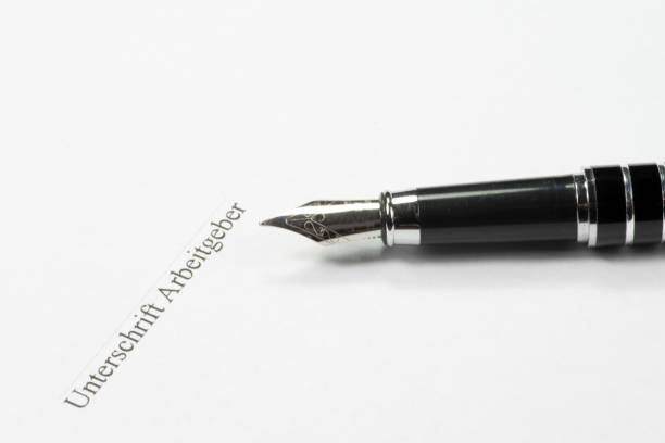 istock An employment contract and a pen 839845432