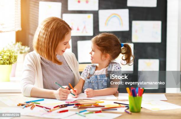 Mother And Child Daughter Draws In Creativity In Kindergarten Stock Photo - Download Image Now