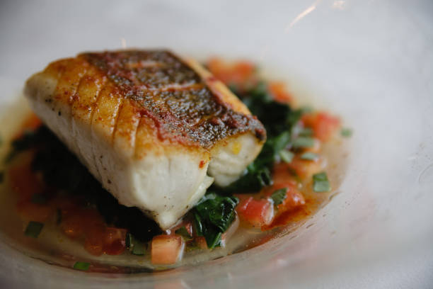 istock Seared sous vide cod filet on a bed of vegetables 839851892