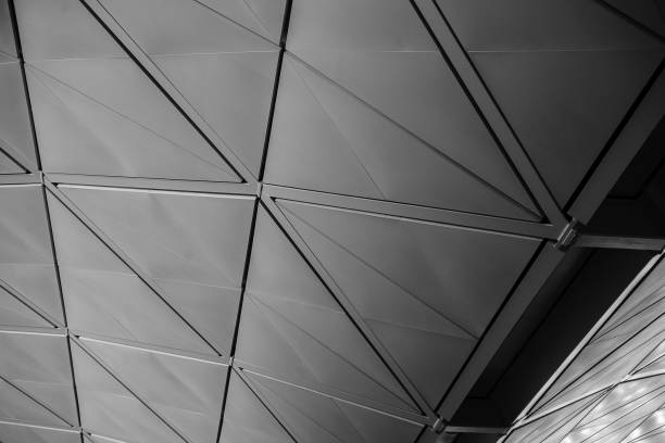 istock Abstract triangular architectural detail of an airport ceiling 839851968