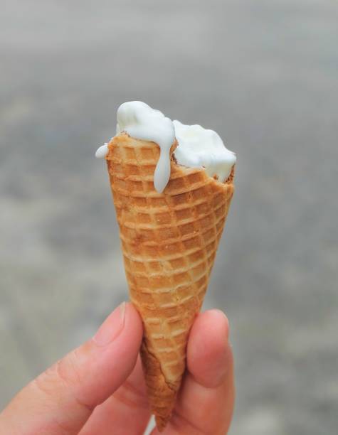 istock Hand Holding Ice Cream Cones with Chocolate 839852906