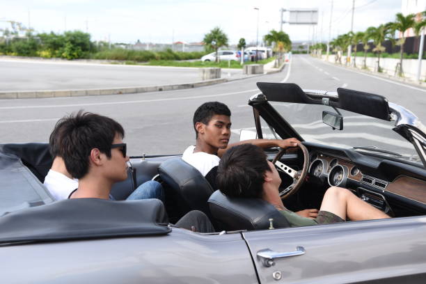 istock Friends driving by car 839856266
