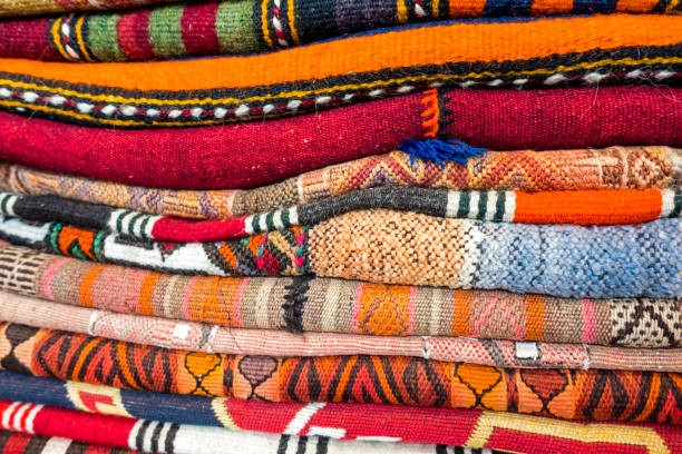 Folded carpet and rug background texture
