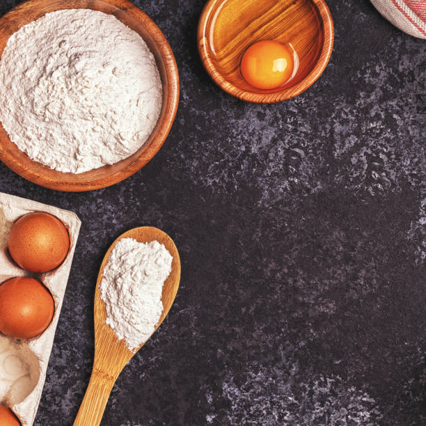 istock Ingredients for baking  - flour, wooden spoon, rolling pin, eggs. 839856952