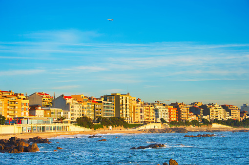 View of seashore front district at sunset. Porto, Portugal