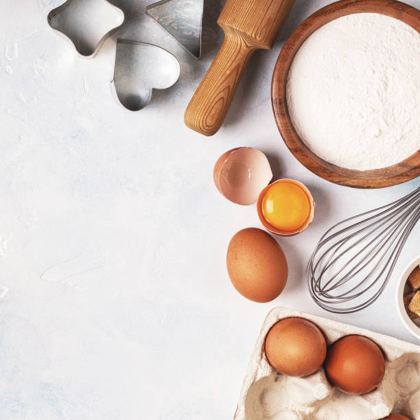 istock Ingredients for baking  - flour, wooden spoon, rolling pin, eggs. 839857382