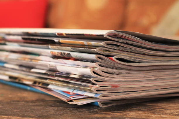 istock Magazines on the wooden table 839859628