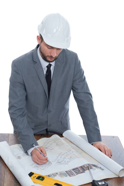 istock Handsome mature contractor drawing a building plan 839863936