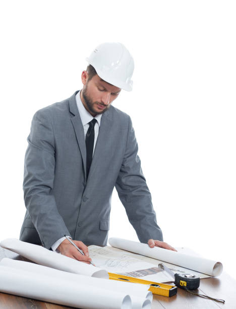 istock Handsome mature contractor drawing a building plan 839863954