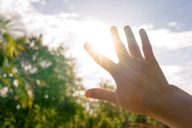 istock Sun blind with hand in hot summer - heat concept. 839868780