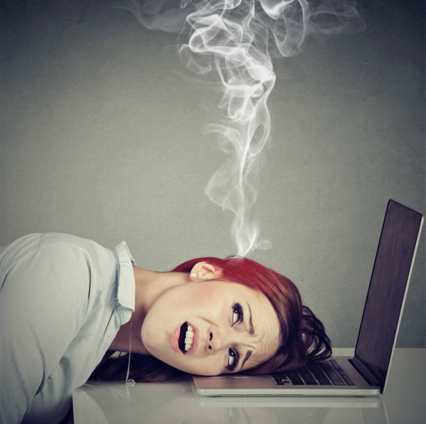 istock Stressed employee woman with overheated brain using laptop 839871600