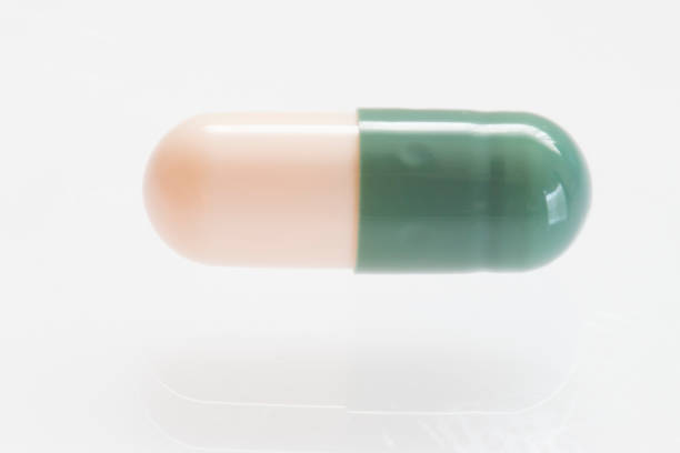 istock green and ivory capsule medicine 839871634