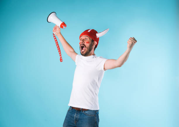 istock The football fan over blue 839872328