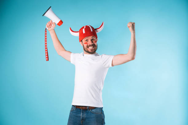 istock The football fan over blue 839872400