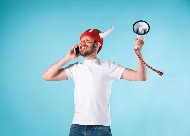 istock The football fan over blue 839872596