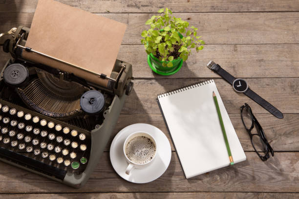 Vintage typewriter on the old wooden desk