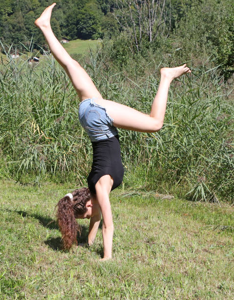 istock Gymnast in a Meadow 839886442