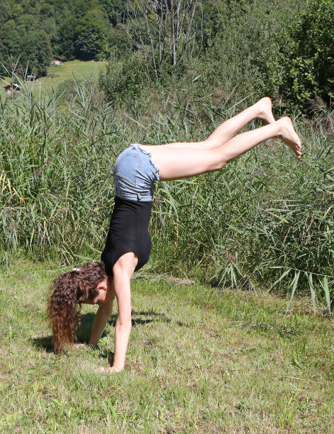 istock Gymnast in a Meadow 839886456