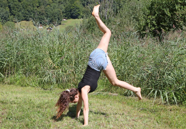 istock Gymnast in a Meadow 839886478