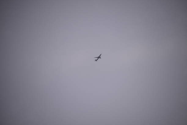 istock Clouds and plane in the Spanish sky 839887560