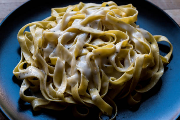 istock Tagliatelle Pasta with Cheese Sauce / Carbonara 839890354