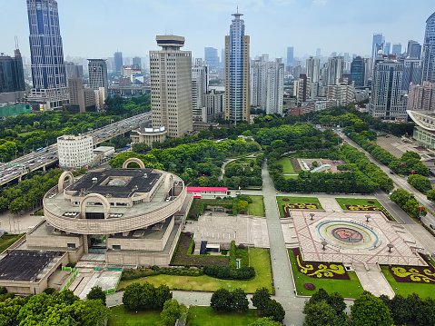 Aerial view of People Square in downtown Shanghai with Shanghai Museum building in the foreground.