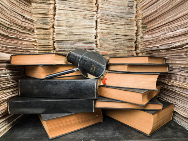 istock Holy Bible Seen In Library Through Magnifying Glasses 839897766