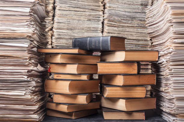 istock Holy Bible Seen In Library Through Magnifying Glasses 839897868