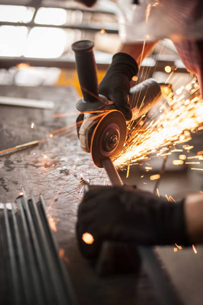 istock Electric wheel grinding on steel structure in factory 839900410