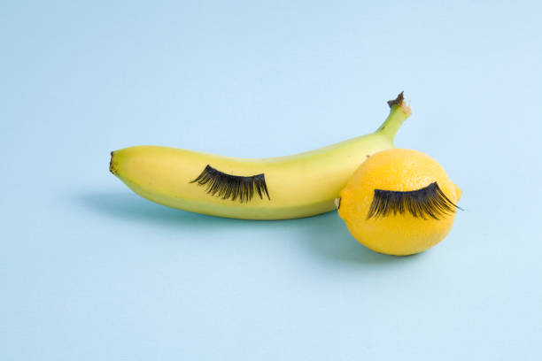 fruit eyelashes - apple fruit surreal bizarre imagens e fotografias de stock