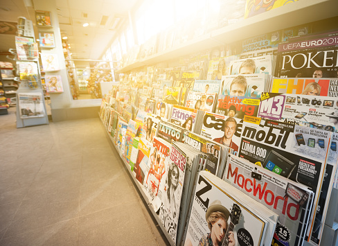 News stand. Mixed magazines and papers.