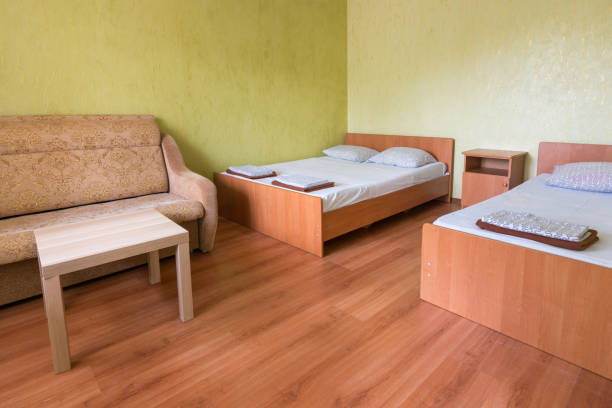 Interior of the room of a budget hotel with two beds stock photo